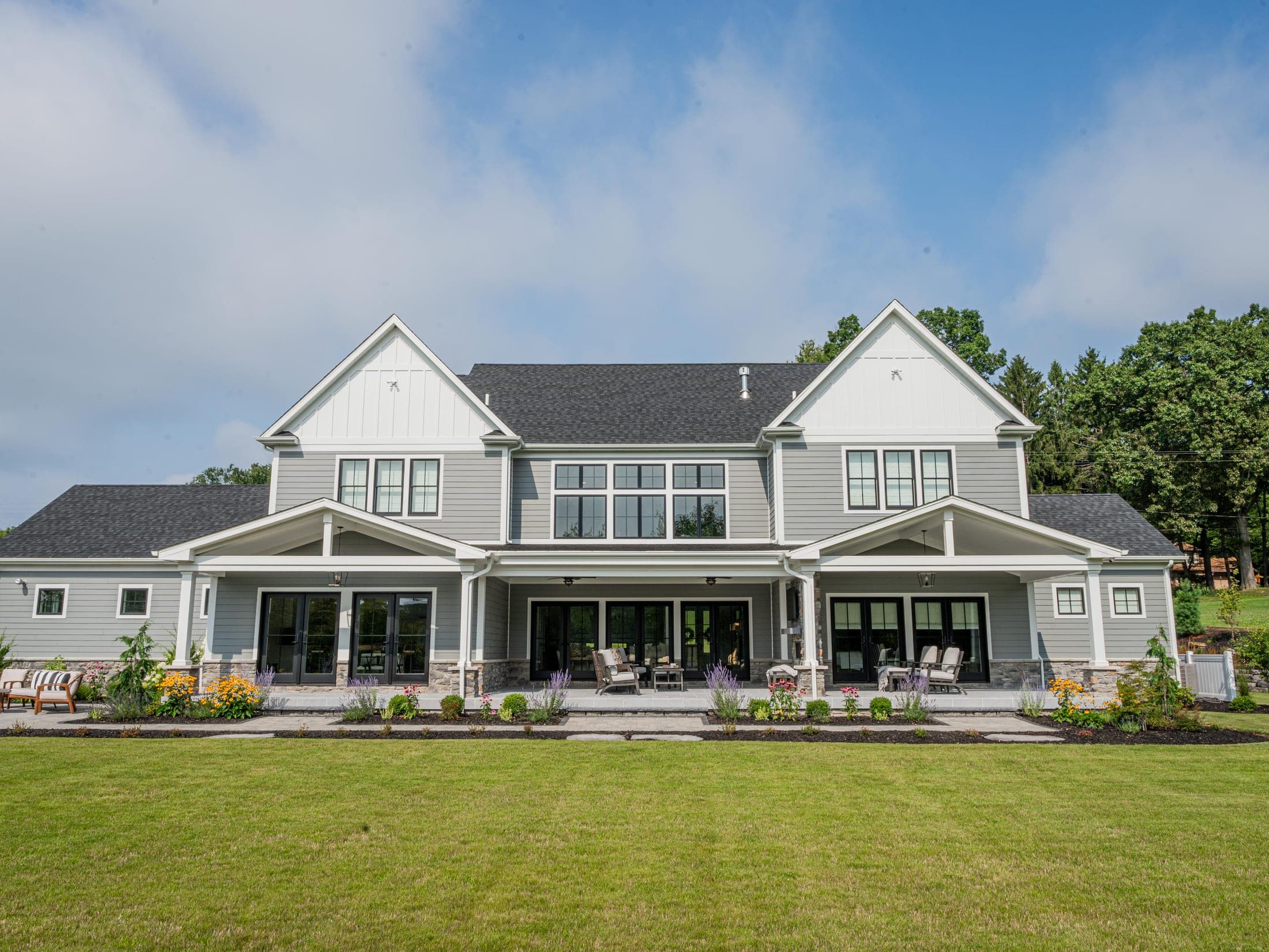 estate farmhouse rear exterior - Elements Landscape Management