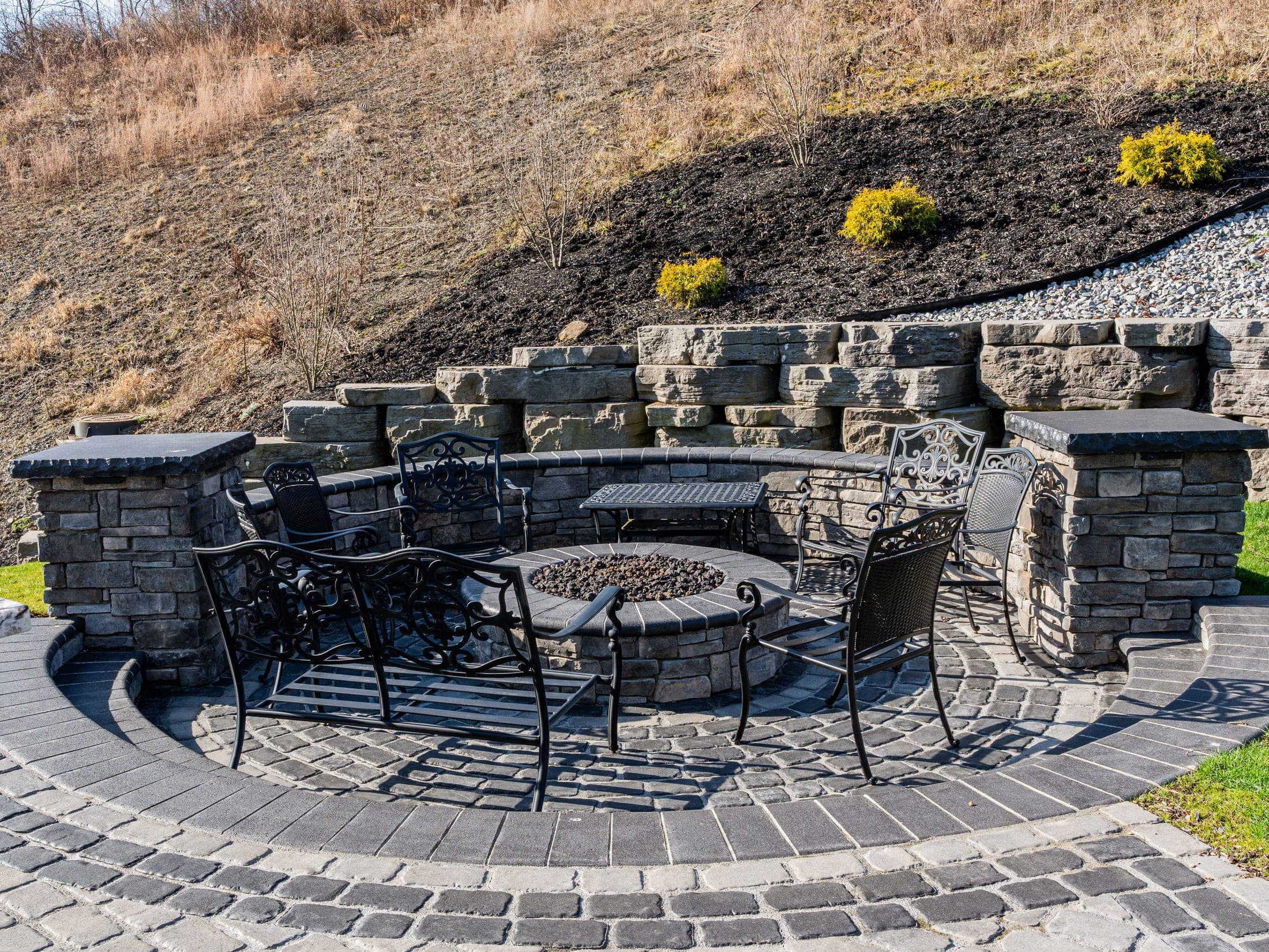 circular fire pit patio iron furniture - Elements Landscape Management
