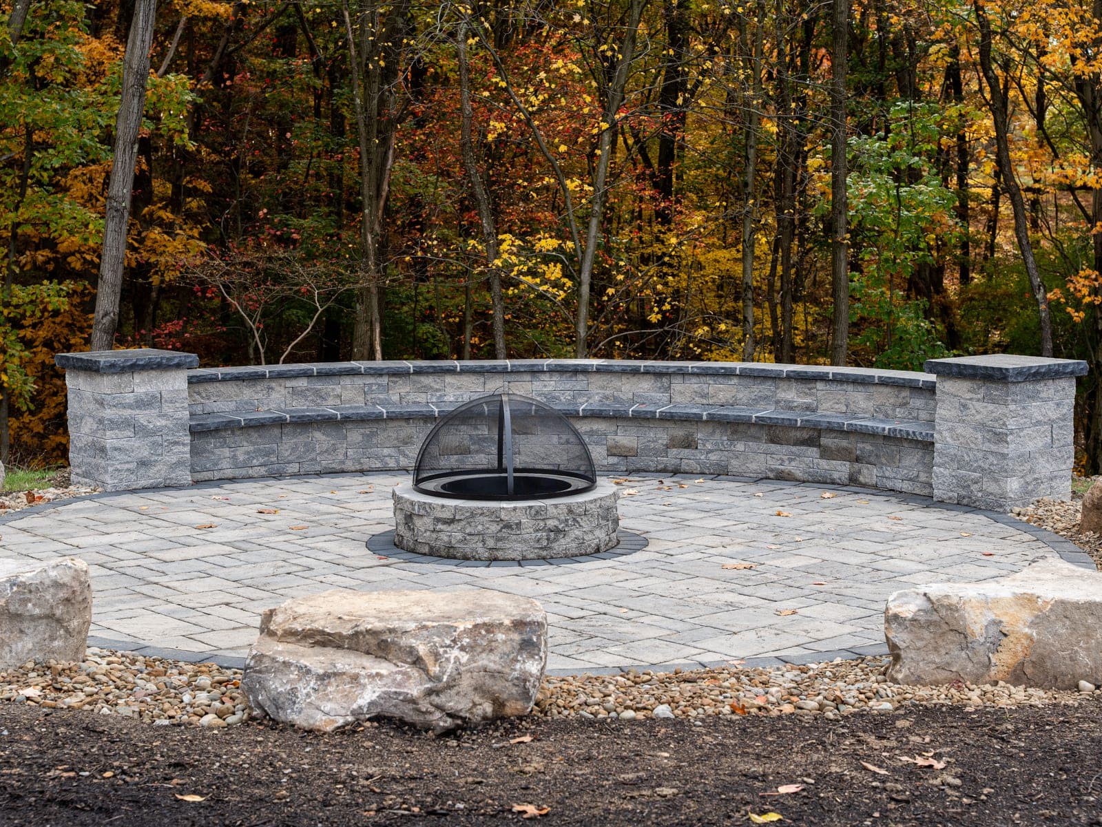 circular fire pit patio symmetric view - Elements Landscape Management