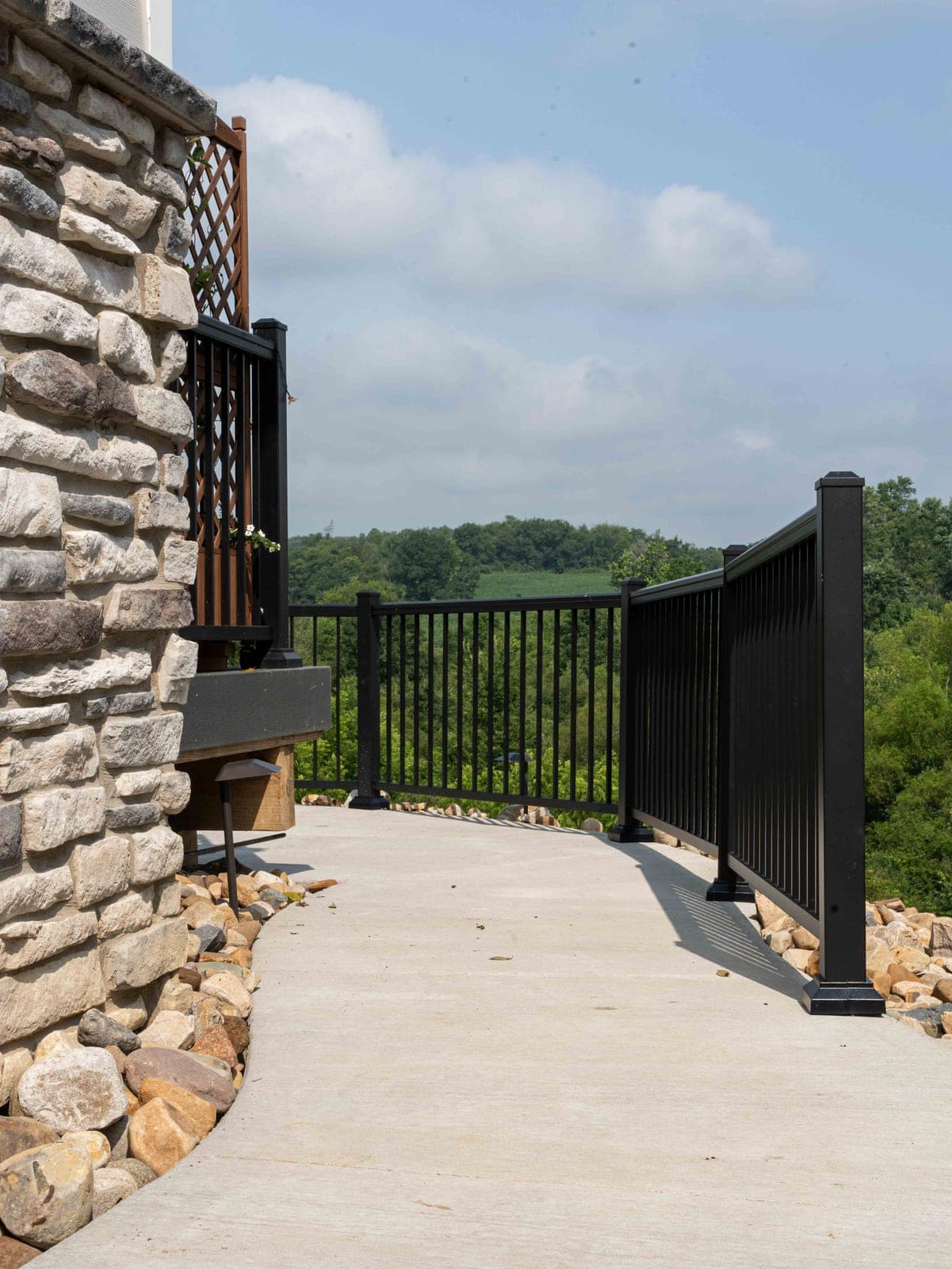 deck railing hillside view - Elements Landscape Management