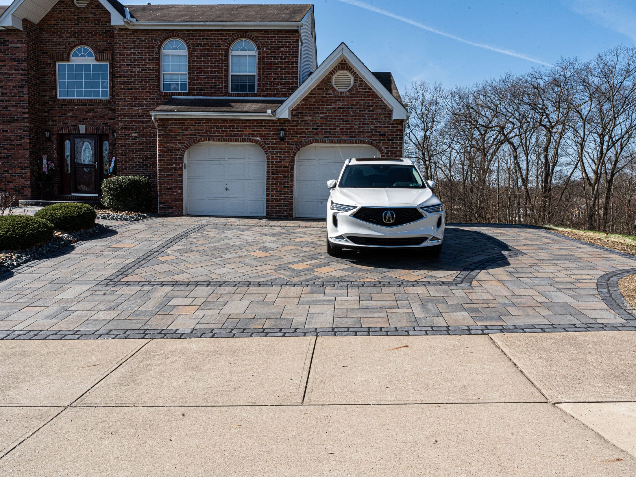 Herringbone paver driveway