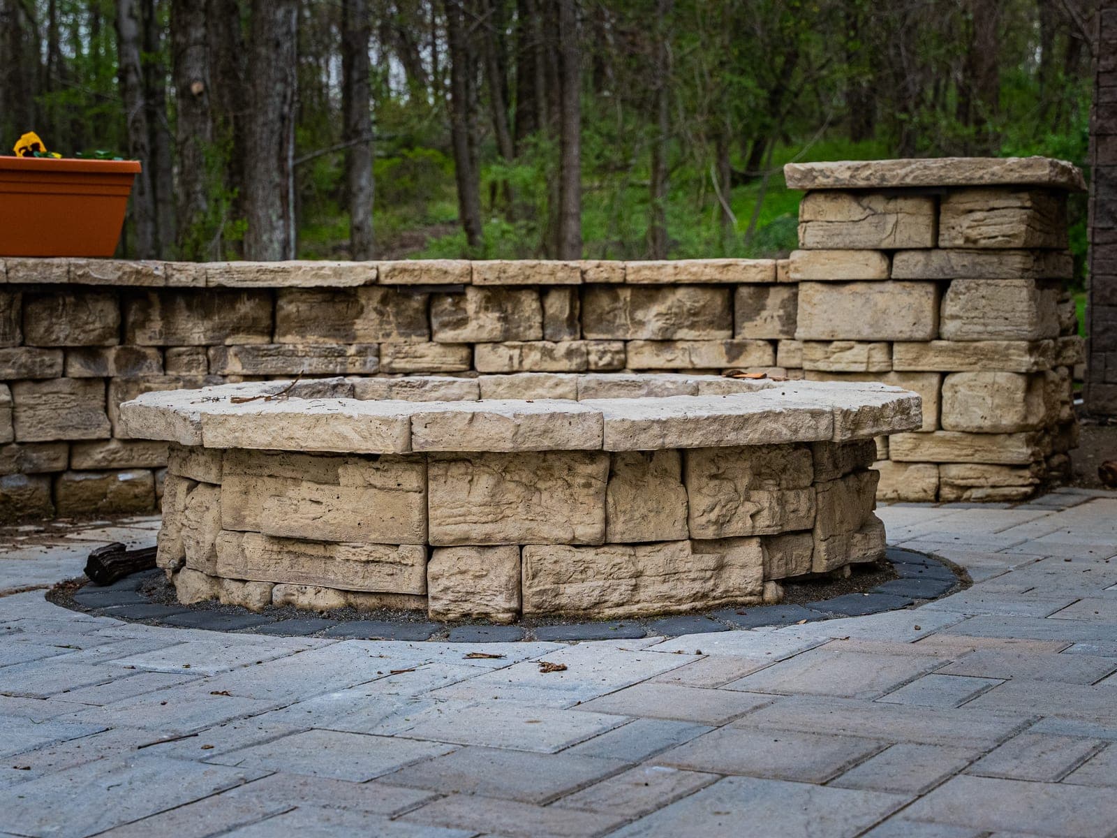 stone firepit patio close - Elements Landscape Management