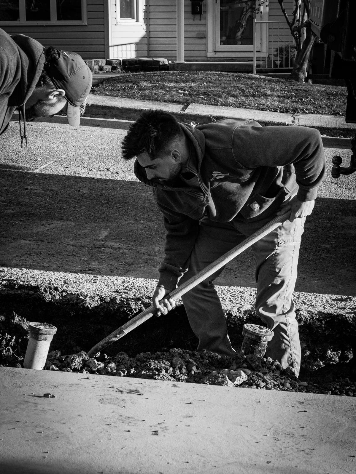 crew hardscape prep bw - Elements Landscape Management