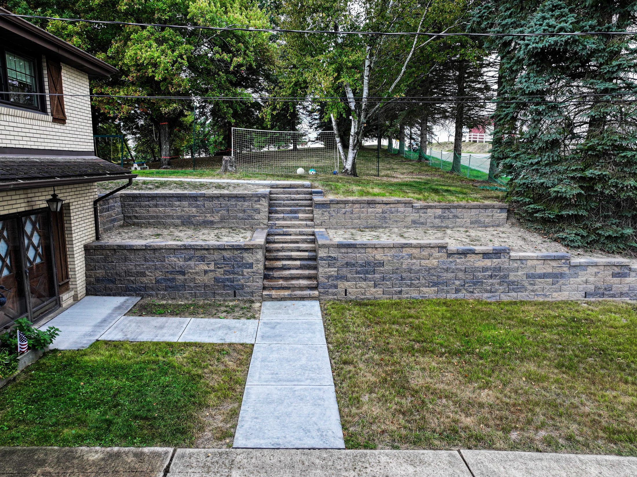 aerial two tier retaining wall backyard - Elements Landscape Management