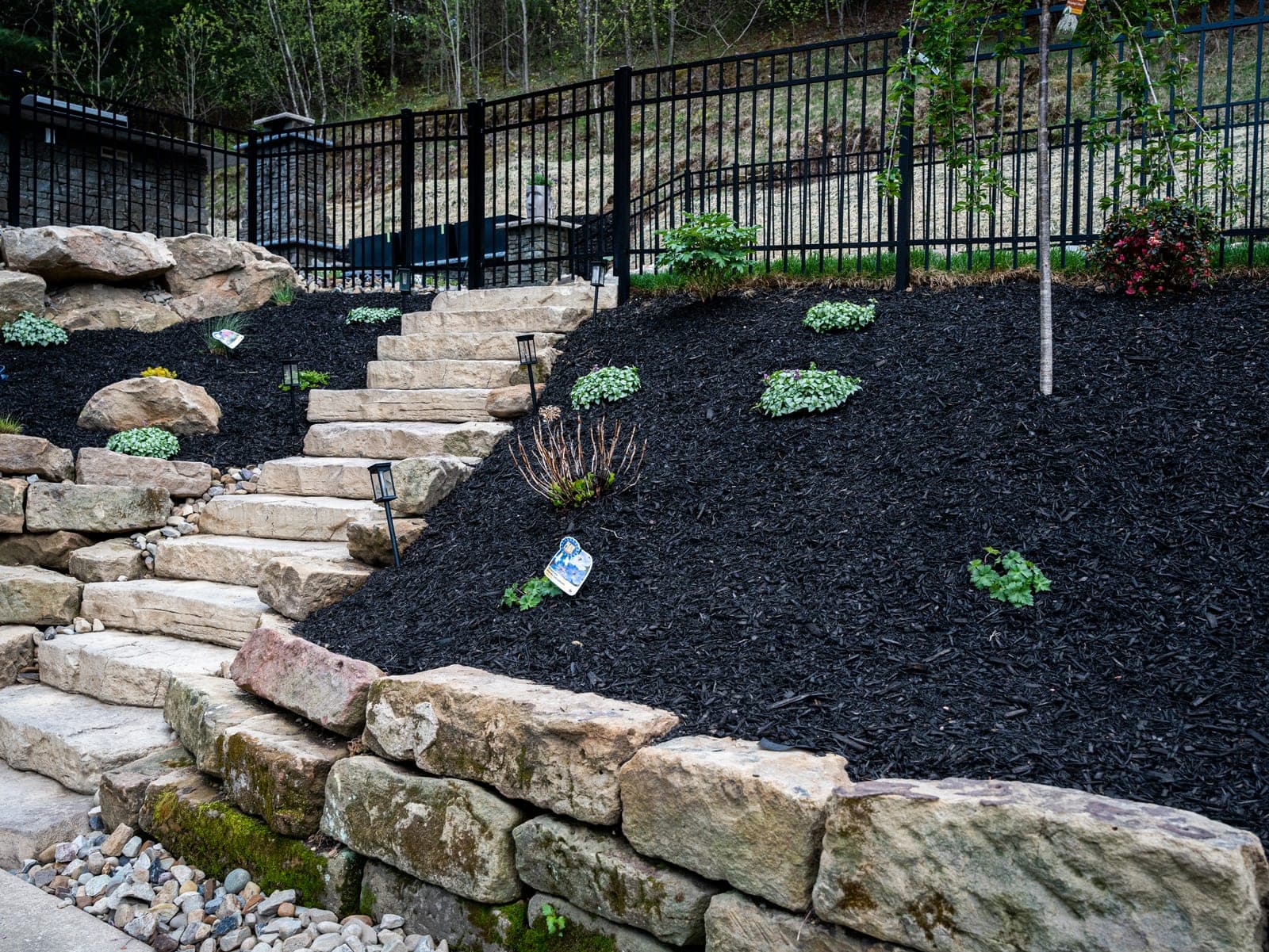 boulder wall lit steps - Elements Landscape Management