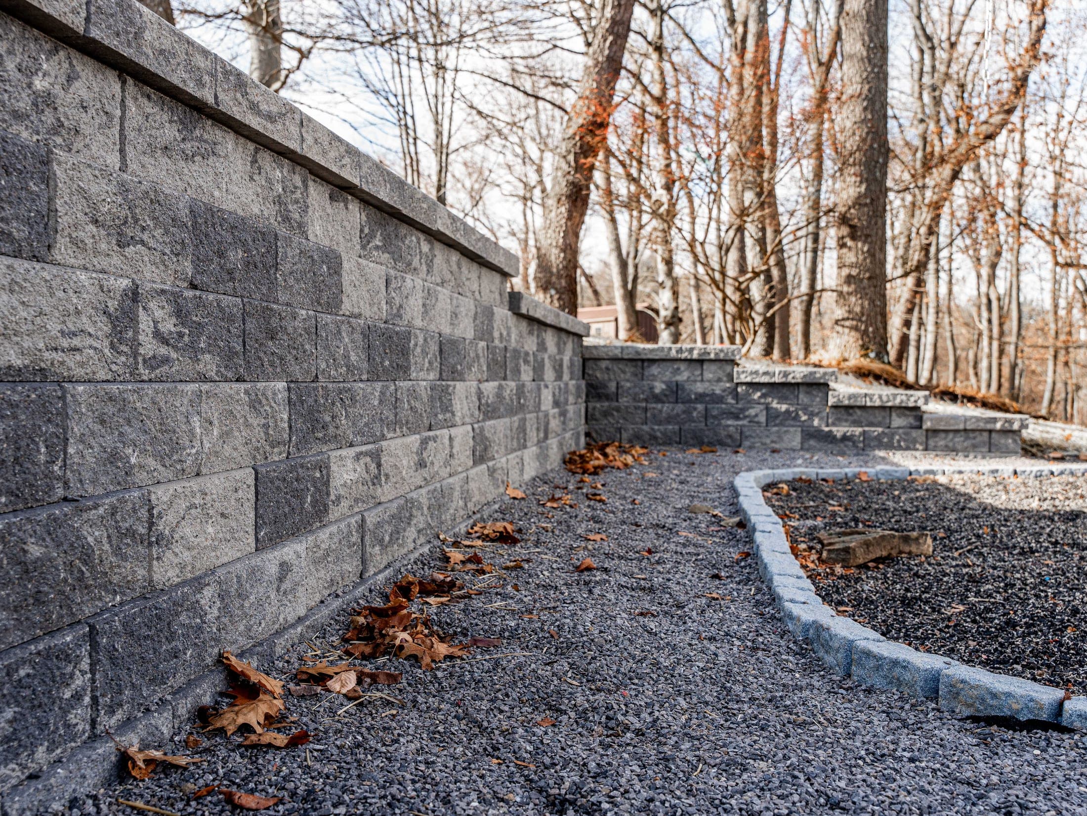 modern stone staircase tiered wall - Elements Landscape Management