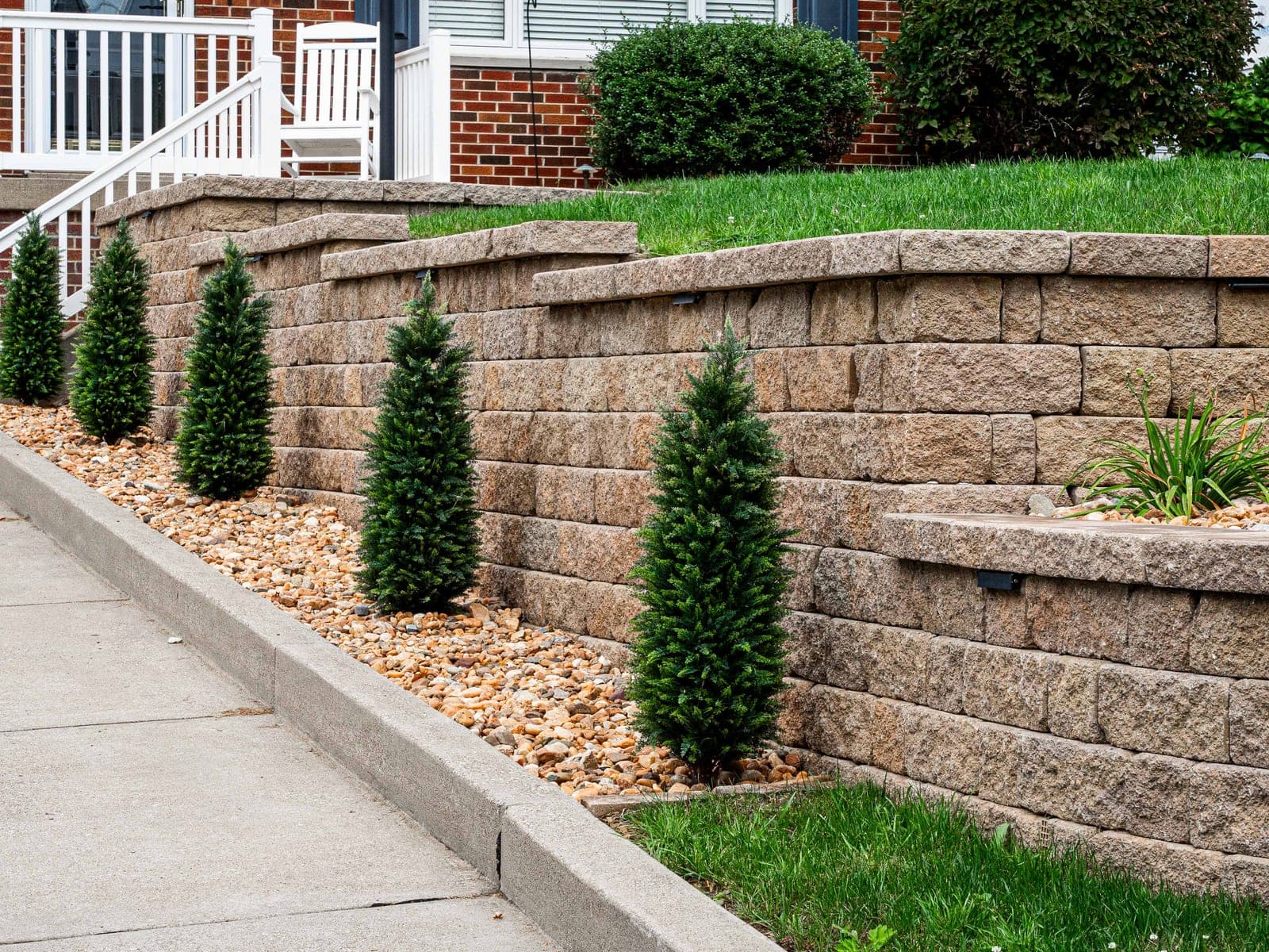 stone retaining wall front yard - Elements Landscape Management