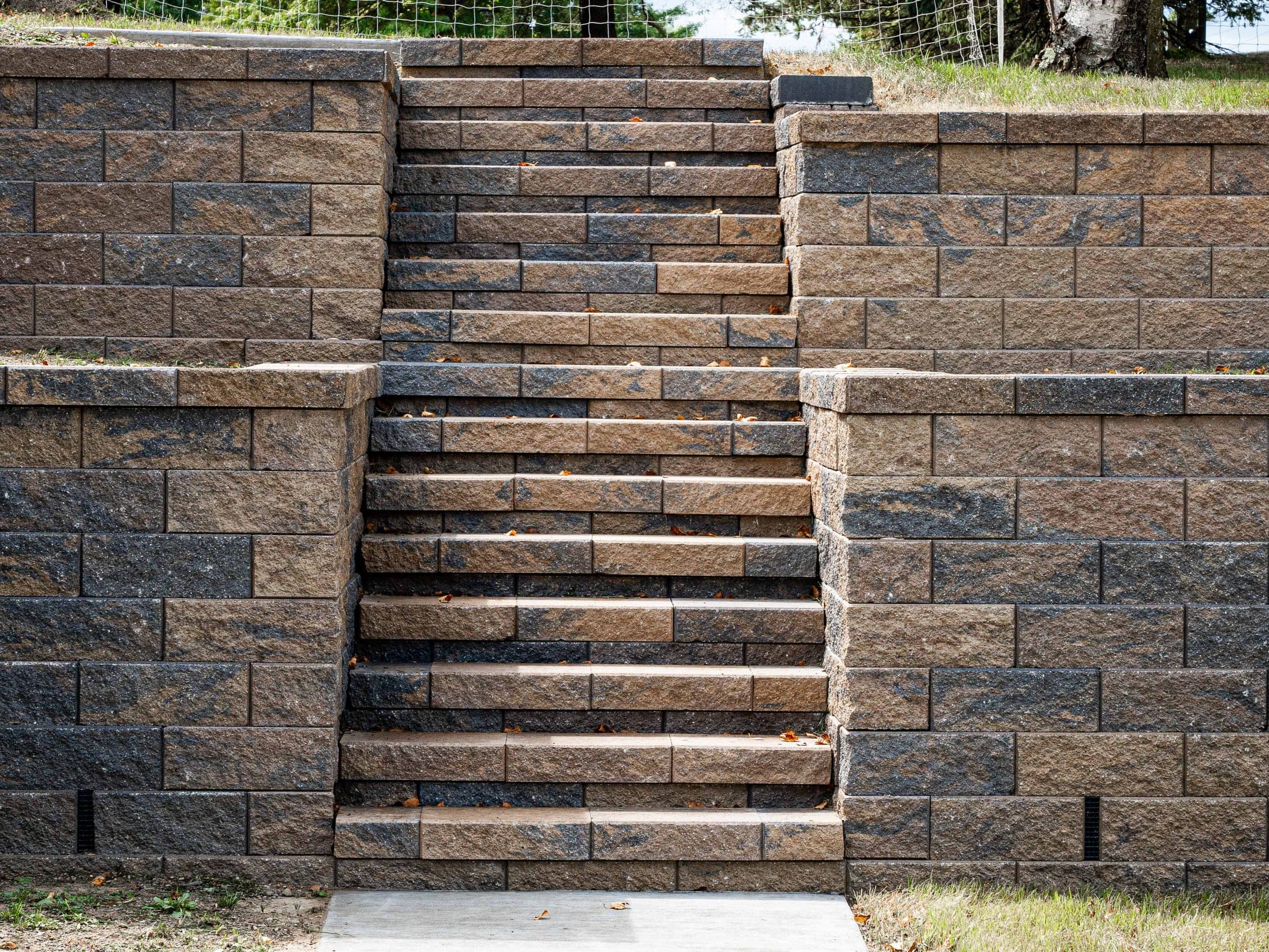 symmetric stone staircase retaining wall - Elements Landscape Management
