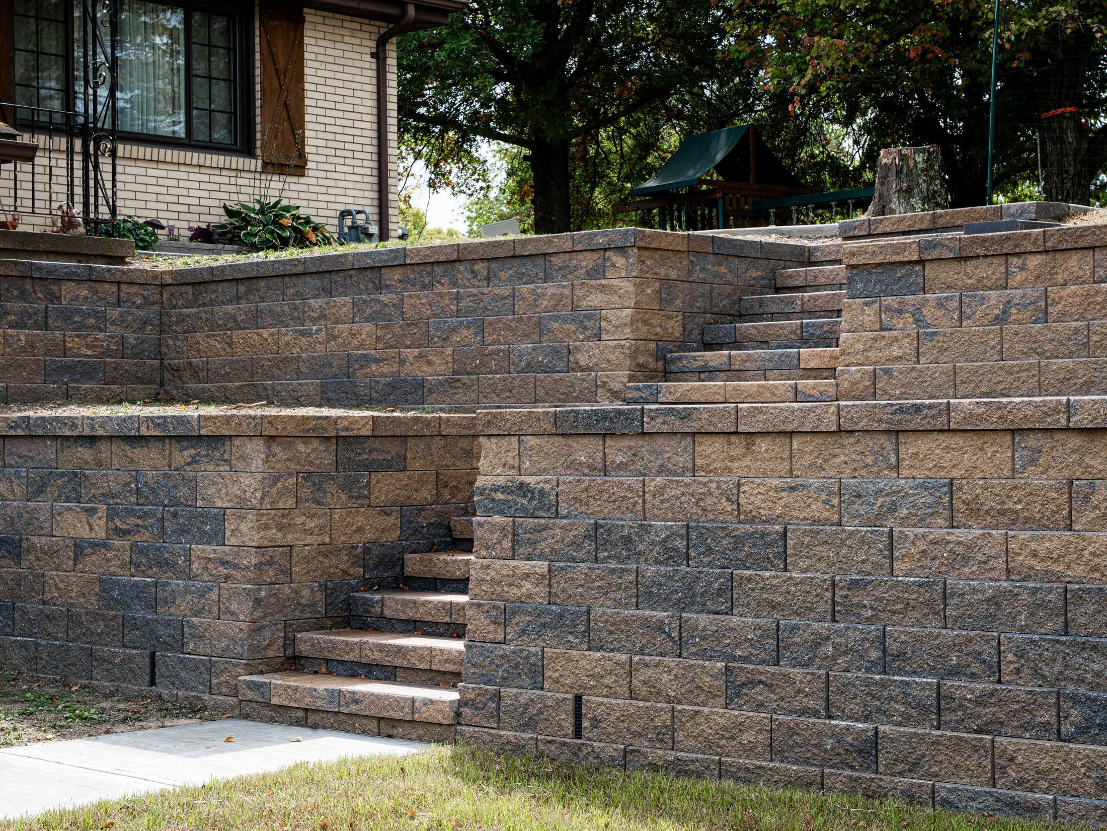 two tier retaining wall grand staircase - Elements Landscape Management