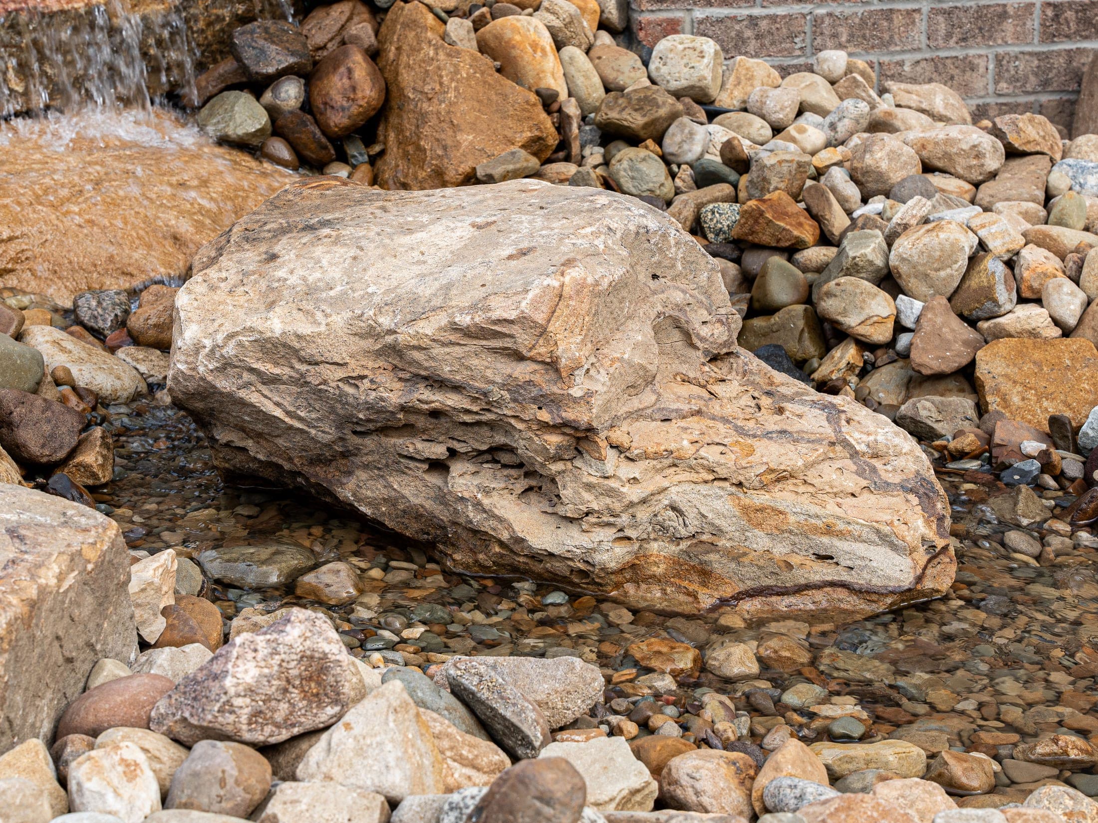 Boulder waterfall viewed from a low angle