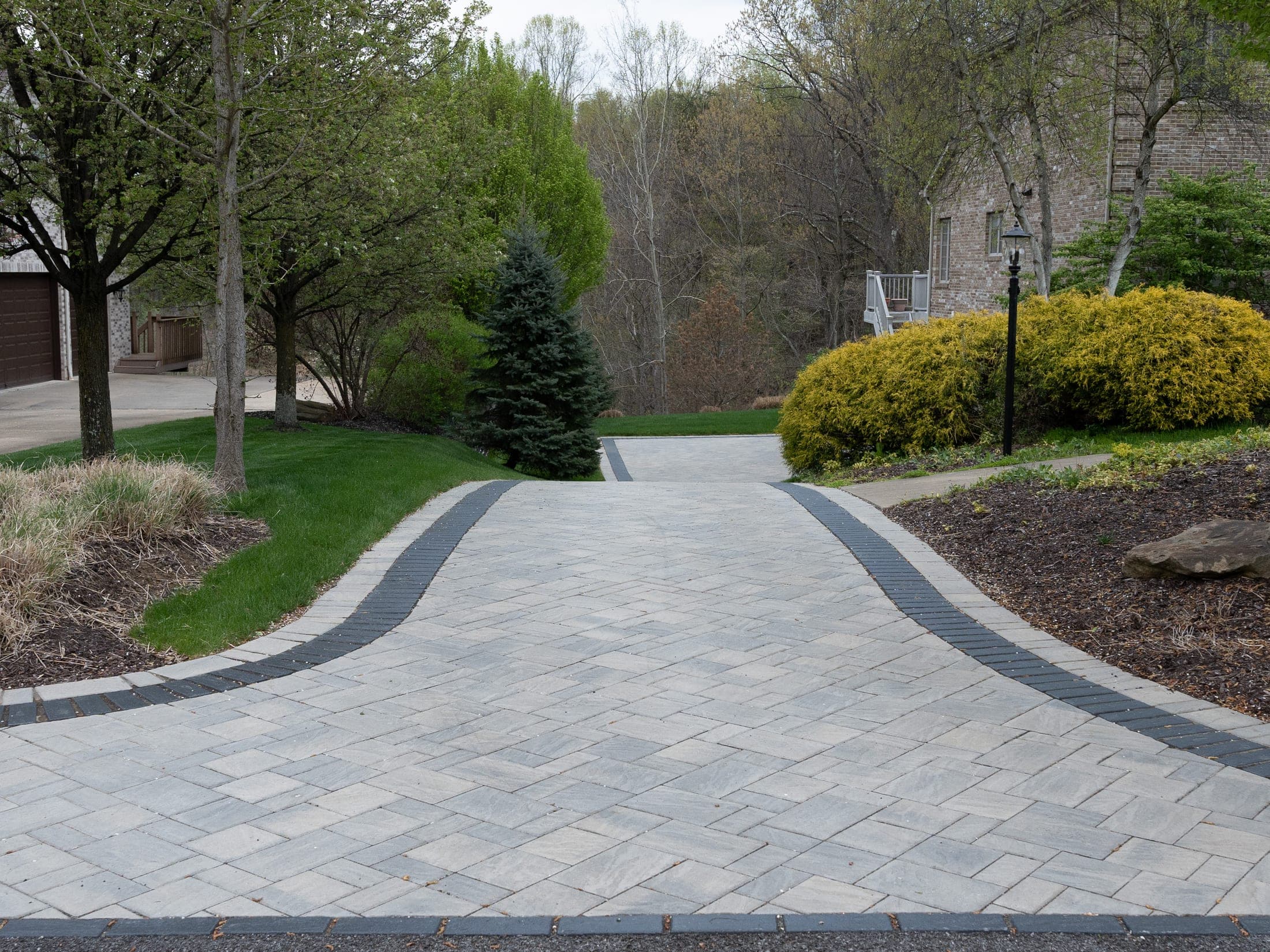Close view of a paver driveway medallion inlay
