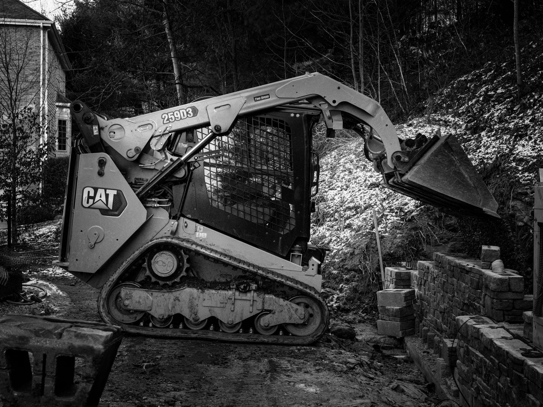 Skid steer on a winter job site